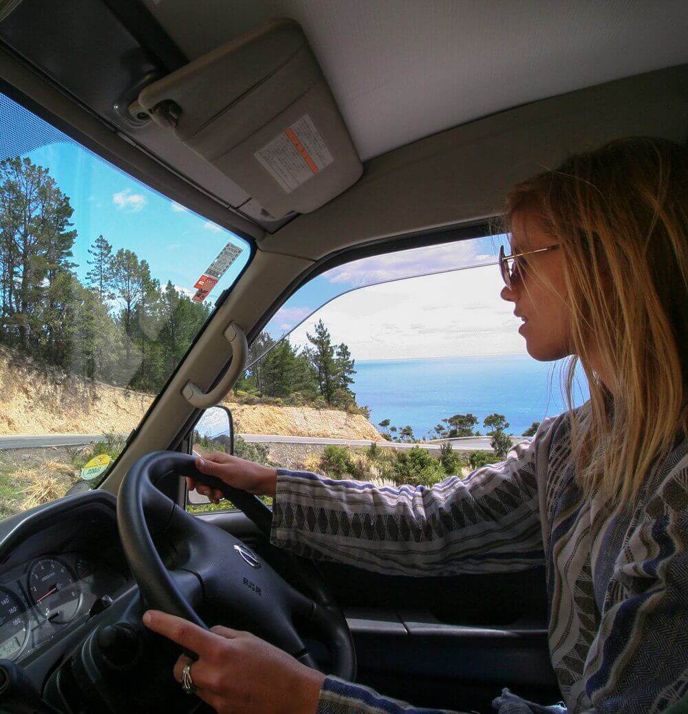 Girl driving a campervan