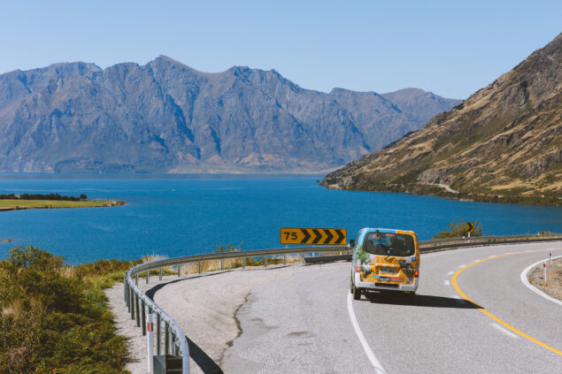 Mountain and lake scenery with campervan